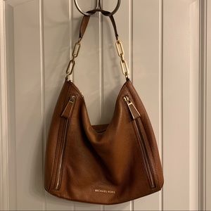 Michael Kors tan brown shoulder bag.